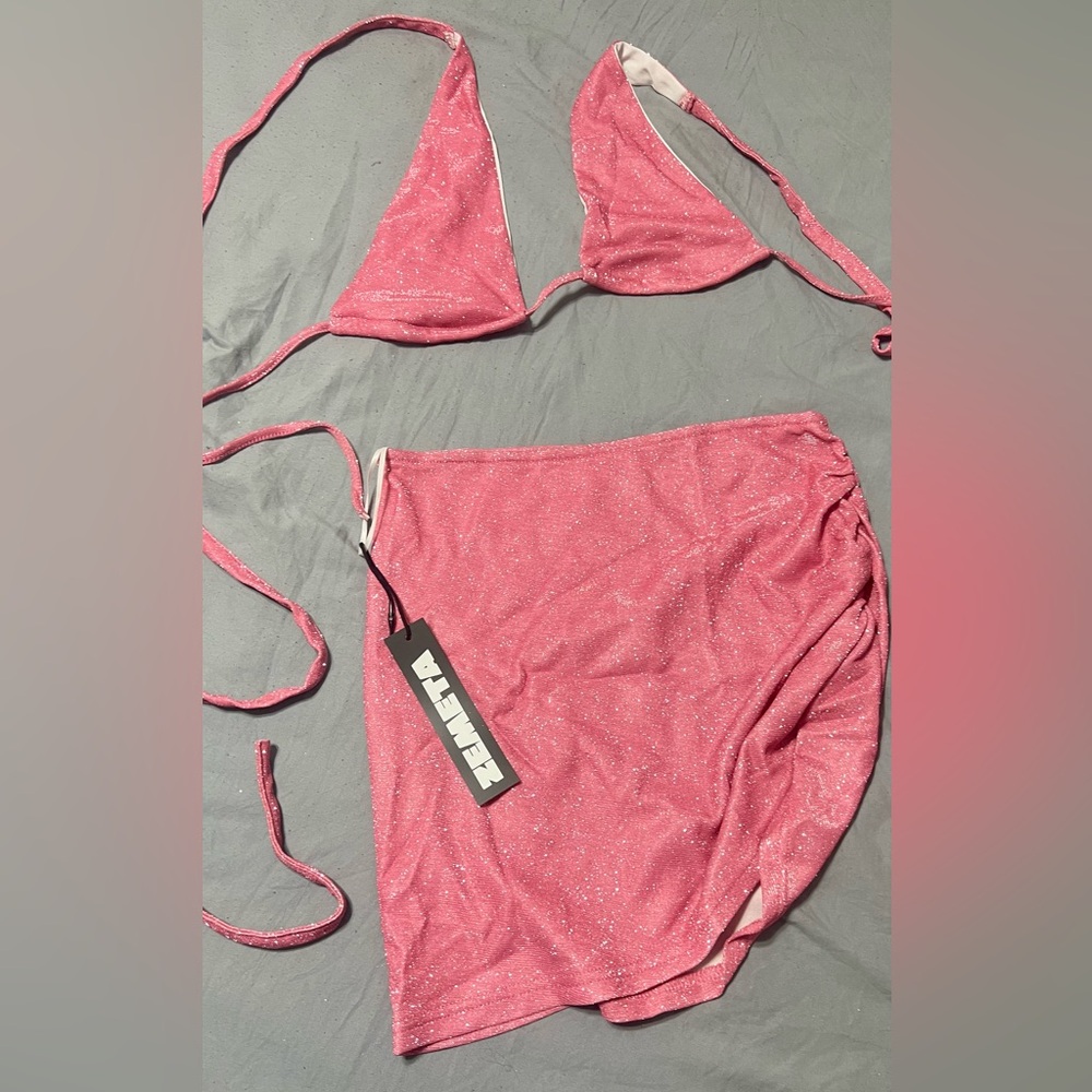 Dolls kill size small two piece pink glitter set.